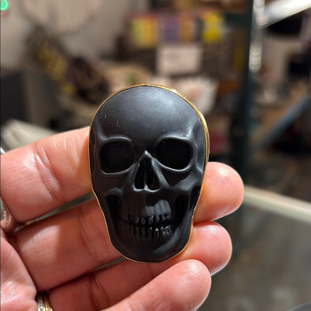 Charles Albert Black and Gold Skull Jewelry Accessory
Pricing is firm